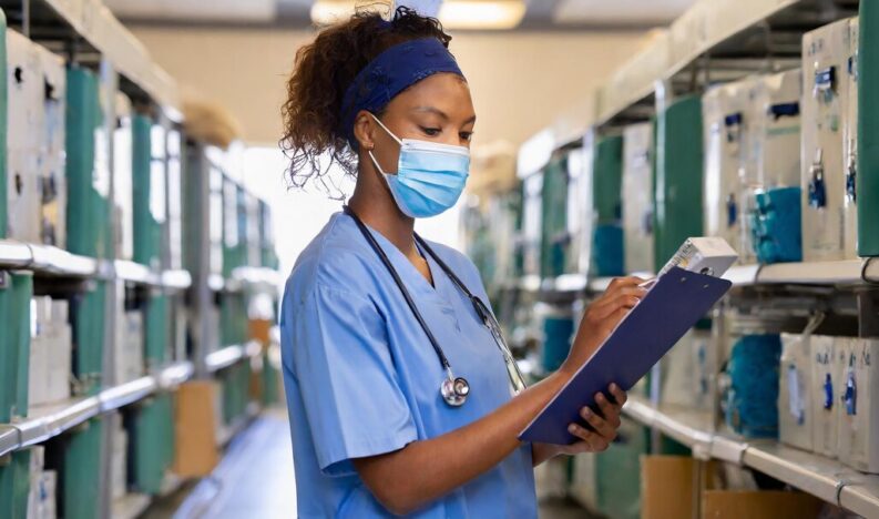 nurse-wearing-protective-face-mask-checking-inventory-hospital_820340-34499 nurse-wearing-protective-face-mask-checking-inventory-hospital_820340-34499